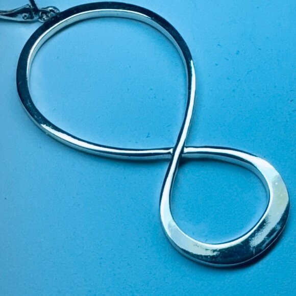 Silver Tone Pierced Earrings Dangling Figure 8 or Infinity Symbol - Picture 2 of 3